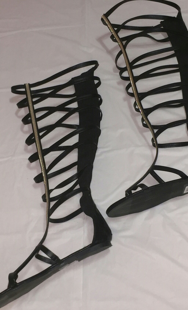 Beautiful long black sandals with gold stripe